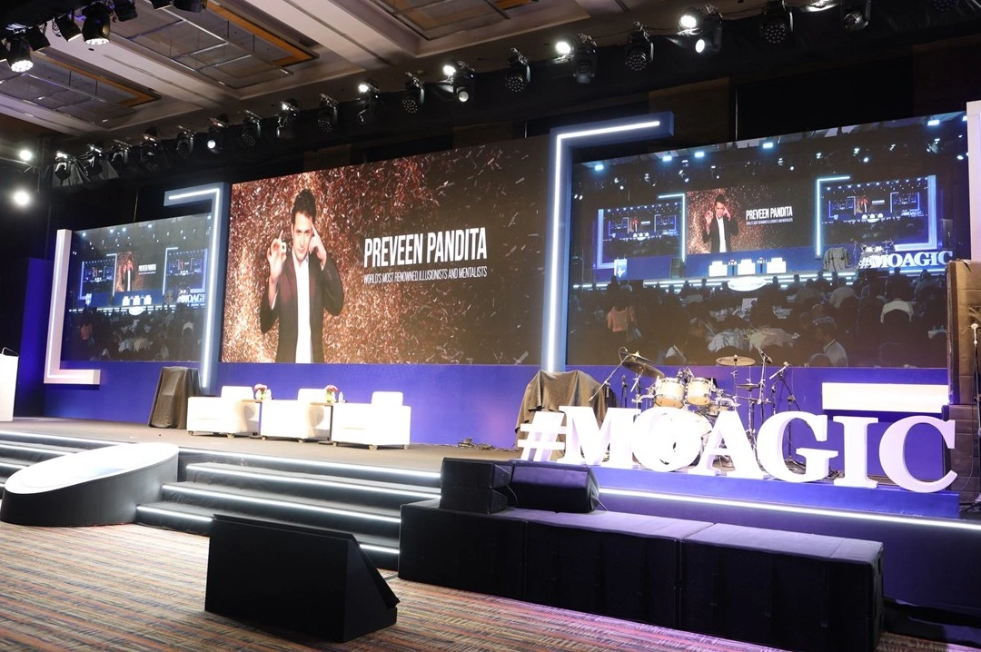 Corporate conference and event setup managed by EMRG Solutions with stage production, branding, and audience engagement.